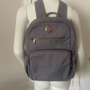 NWOT Delsey Paris Shadow 5.0 Gray Backpack with Rose Gold Details retail $260